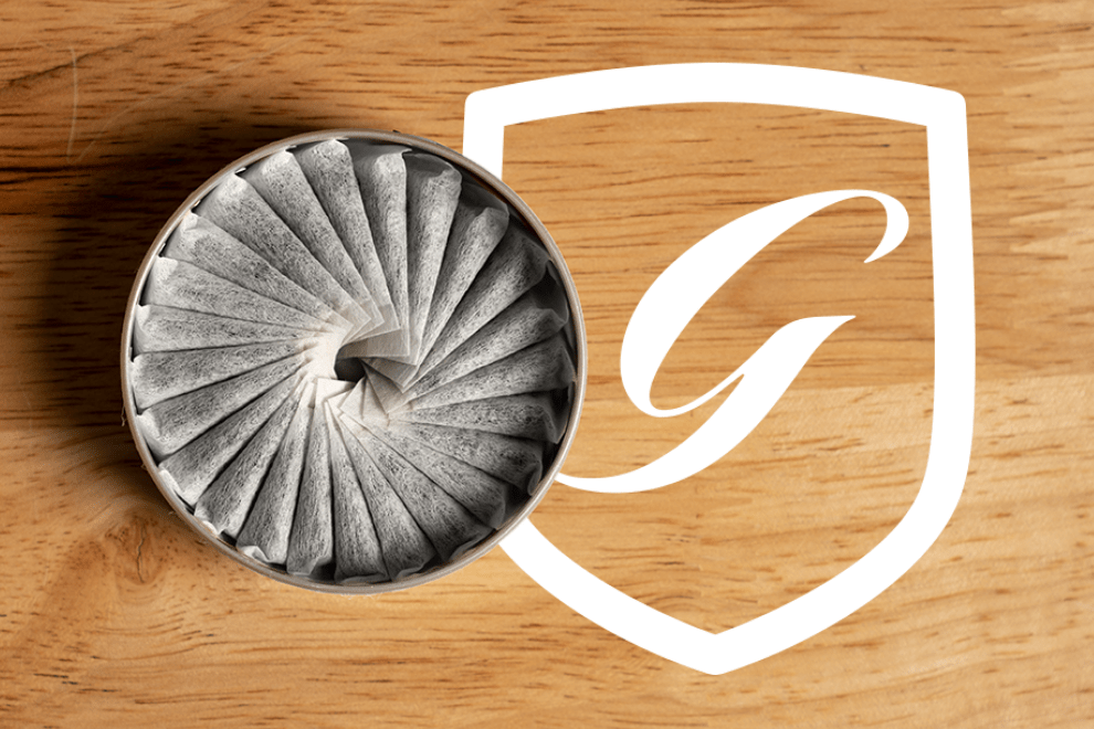 General logo on a table with a General snus can on top.