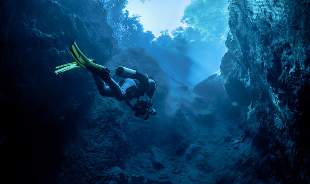 Underwater photo of someone scuba diving.